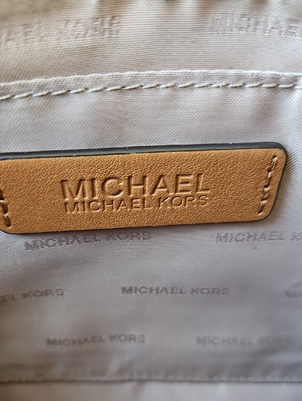 Michael Kors Gold And Cream Signature Perforated Wristlet